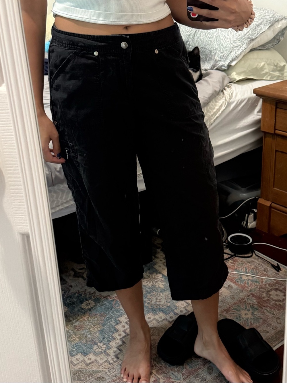 Black capri pants with adjustable straps